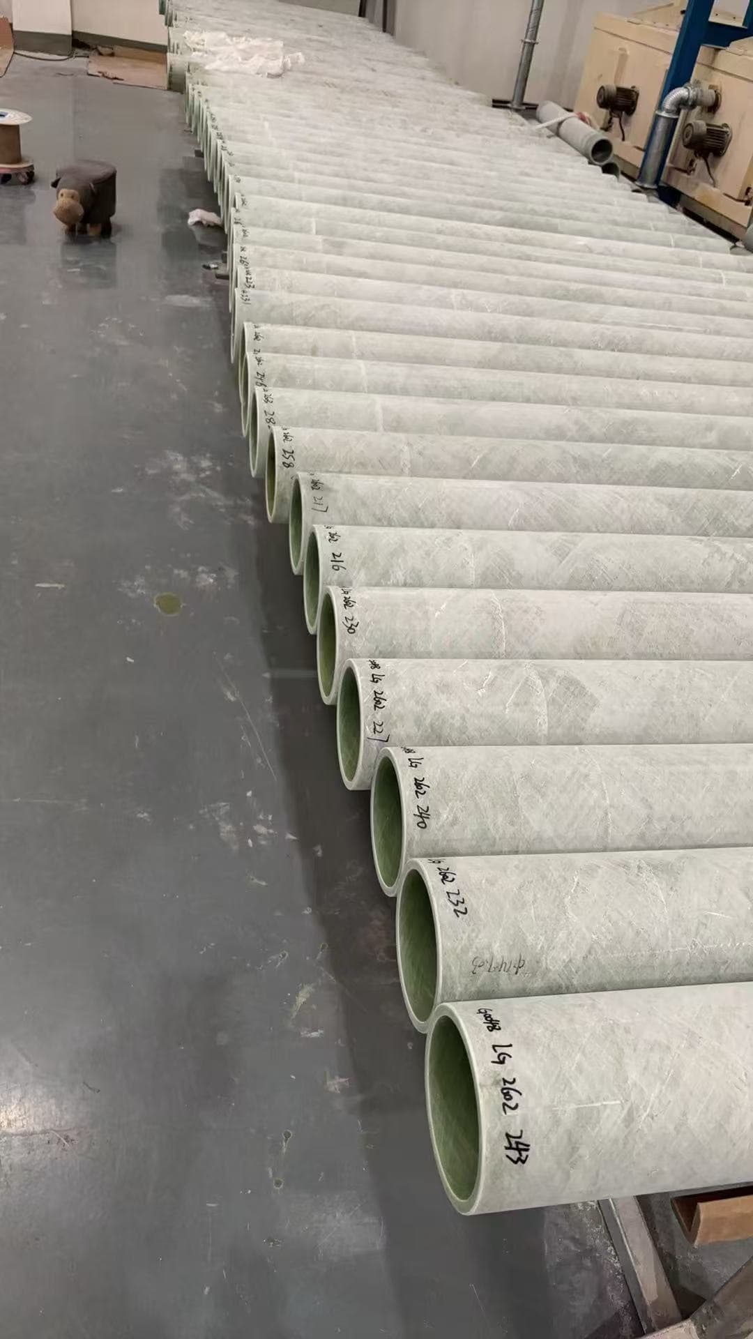 Stacked epoxy fiberglass insulation tubes showing actual tube form